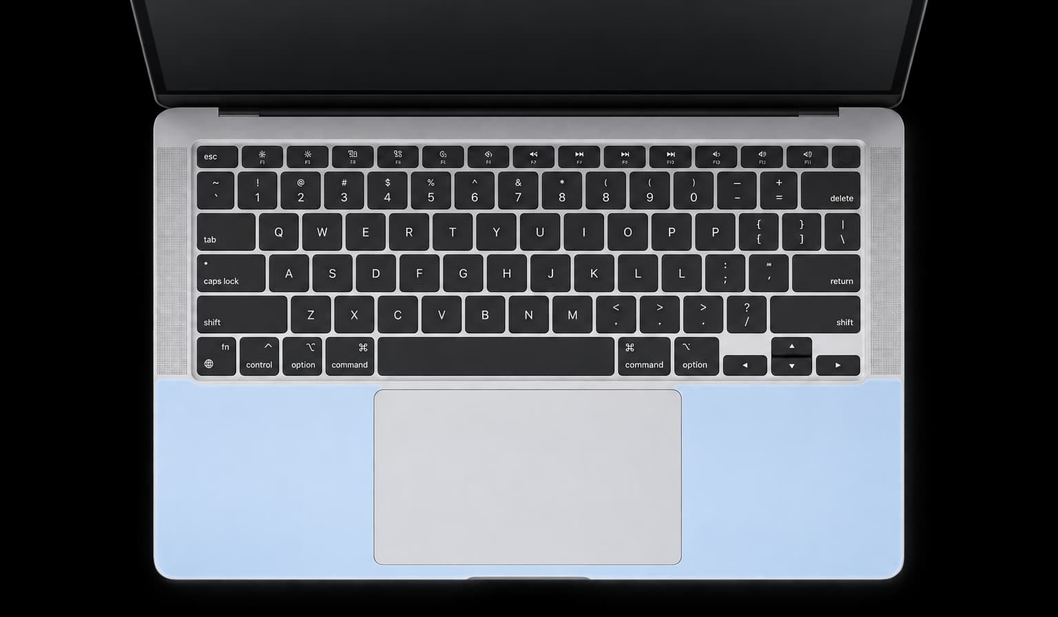 MacBook with the aluminum palm rest around the trackpad highlighted