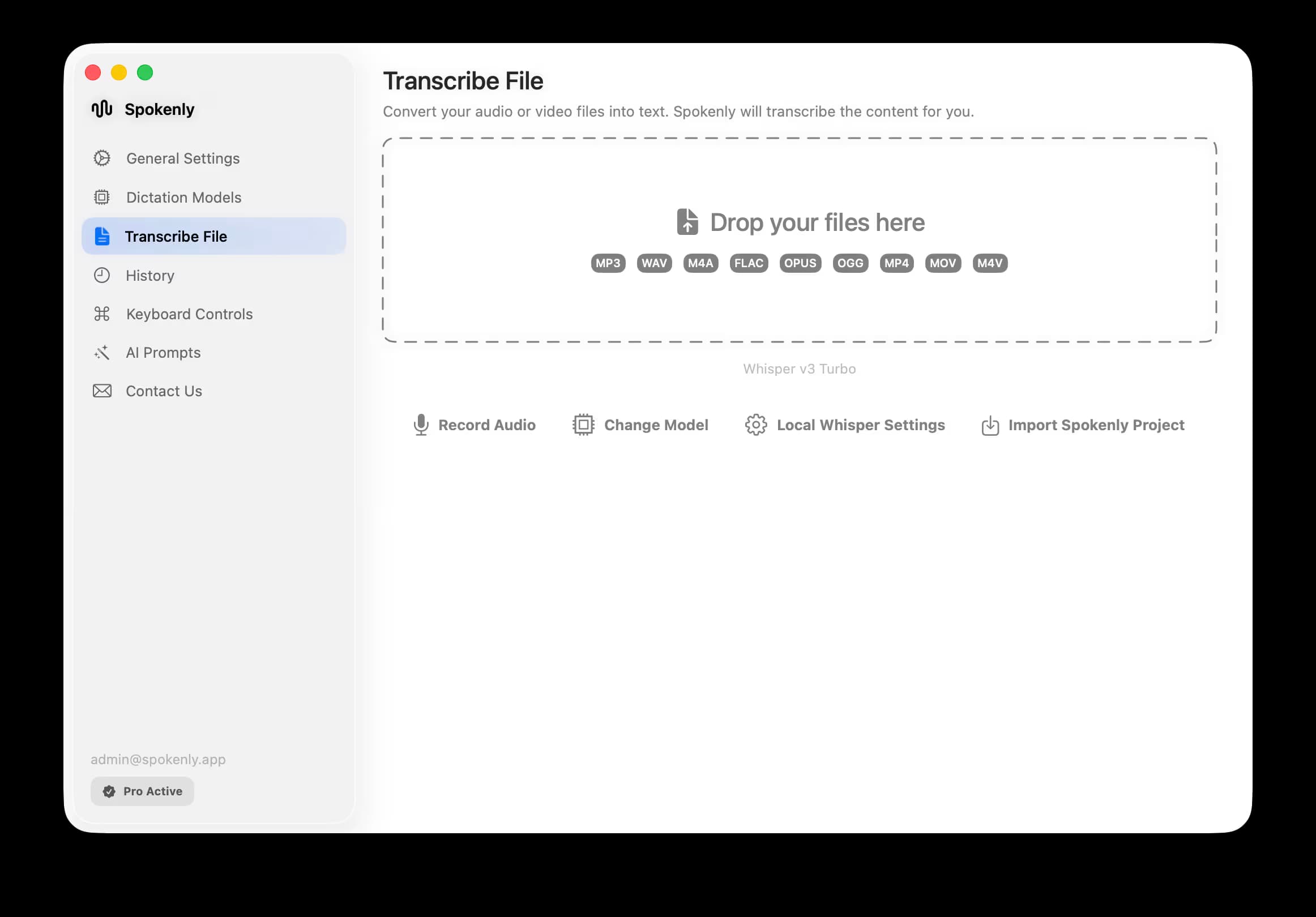Spokenly Transcribe File tab with a drop zone that lists M4A among supported audio formats